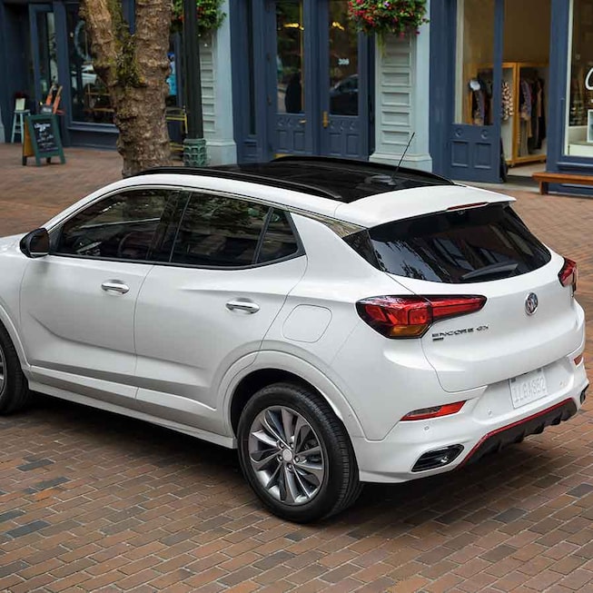 2022 Buick Encore GX ST driving on the road.