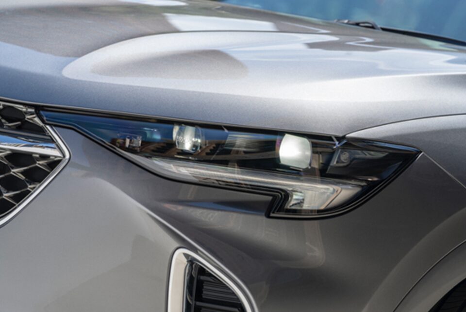 Close-up view of the 2022 Buick Envision headlamps.