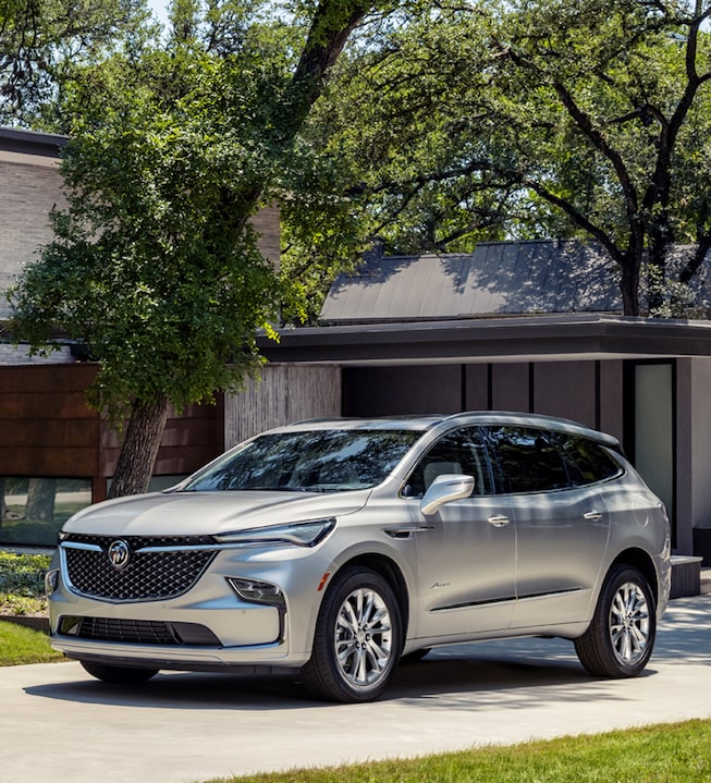 2022 Buick Enclave parked outside a home.