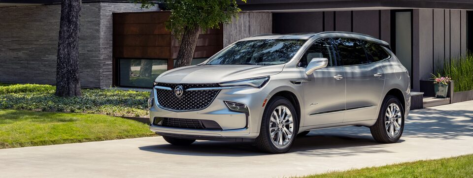 2022 Buick Enclave parked outside a home.