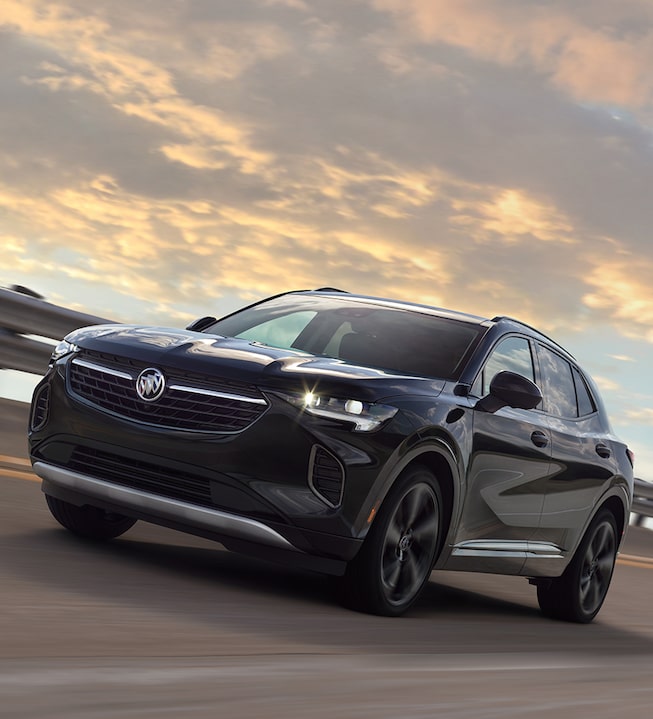 2023 Envision ST driving on a road.