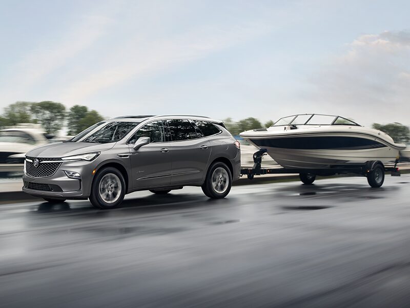 2024 Buick Enclave while towing a yacht.