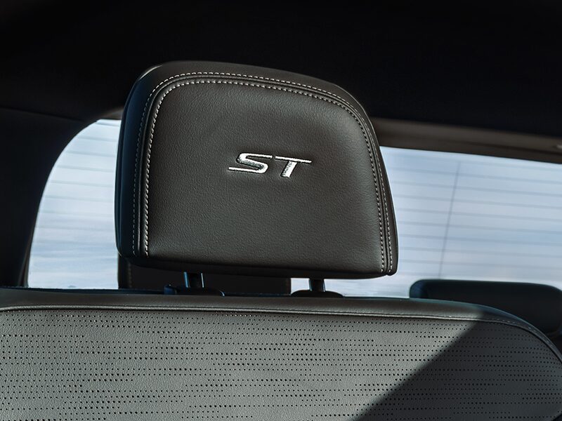 Close up of the ST stitching on the headrest inside the 2025 Buick Enclave ST.