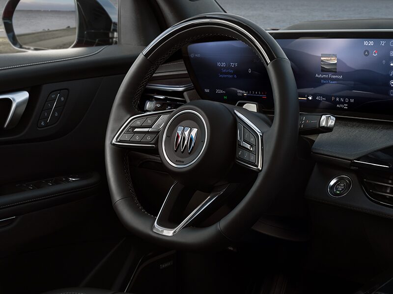 Side view of the steering wheel and dashboard on the 2025 Buick Enclave ST.