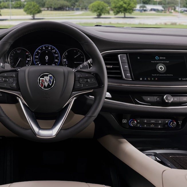 2022 Buick Enclave interior featuring the steering wheel and infotainment system.