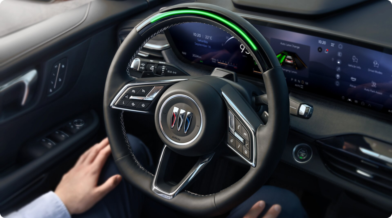 A person utilizing the Super Cruise feature inside an OnStar-subscribed Buick vehicle.