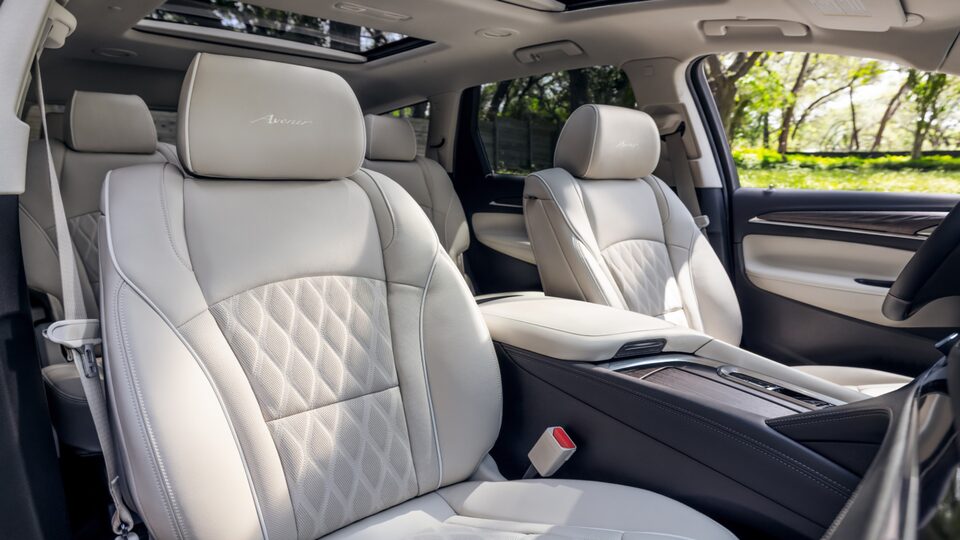 2023 Enclave Avenir mid-size SUV interior seats.