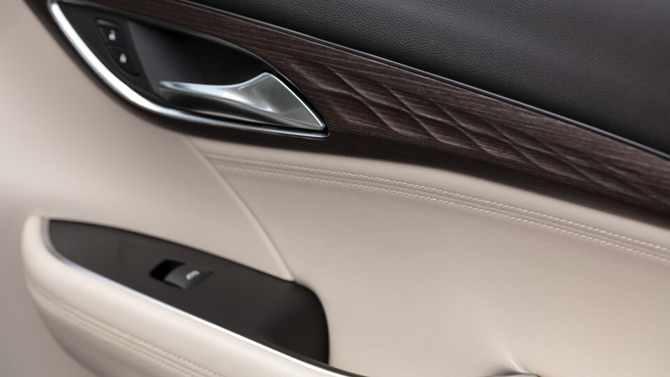 2023 Buick Envision Avenir wood-tone accents.