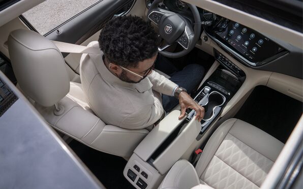 2023 Buick Envision Avenir center console and armrest.