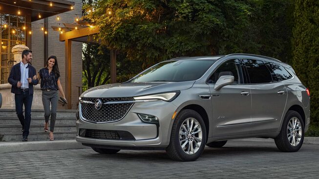 2024 Buick Enclave Avenir parked by the side of a road.