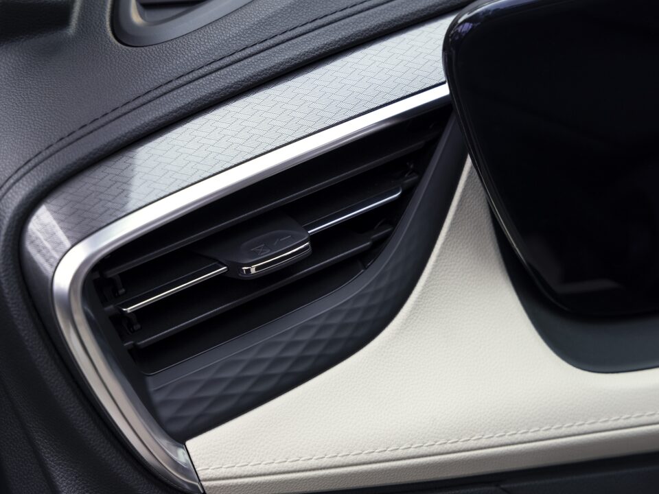 Close-up of the air-conditioning unit of the 2024 Encore GX Avenir.