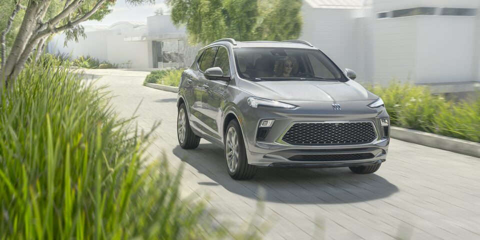 2024 Encore GX Avenir parked on a home driveway.