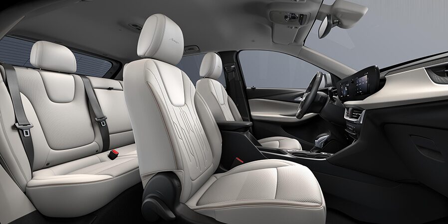 2024 Buick Encore GX Avenir interior seats in Whisper Beige with Ebony Accents.