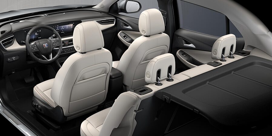 2024 Buick  Encore GX Avenir interior seats in Whisper Beige with Ebony Accents rear view.