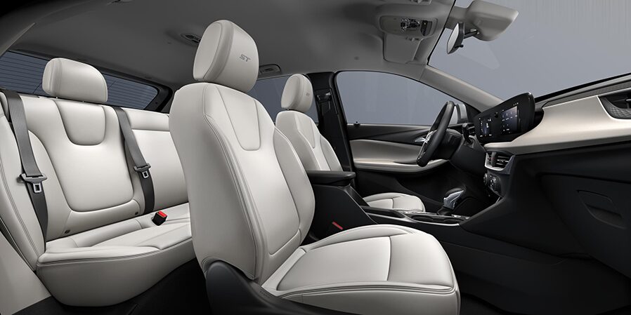 2024 Buick Encore GX ST interior seats in Whisper Beige with Ebony Accents.