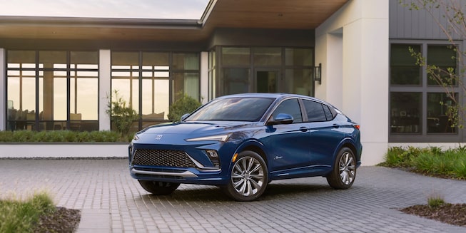 2024 Buick Envista Avenir parked outside a home.