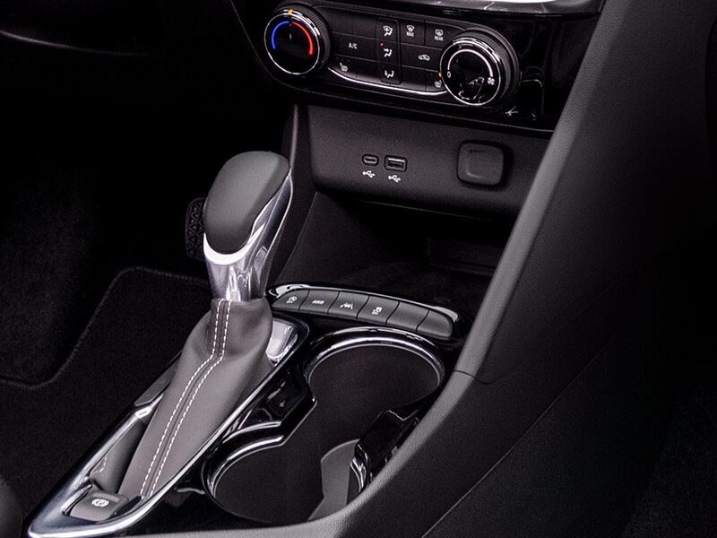 Close up view of the wireless charging port on the 2025 Buick Encore GX ST.