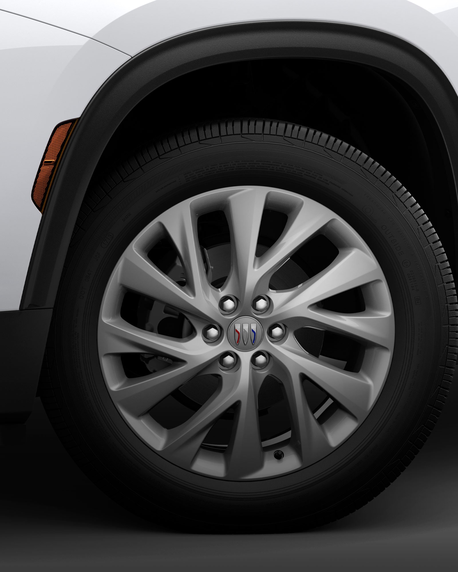 Close-up view of the alloy wheels of the 2026 Buick Enclave Preferred.