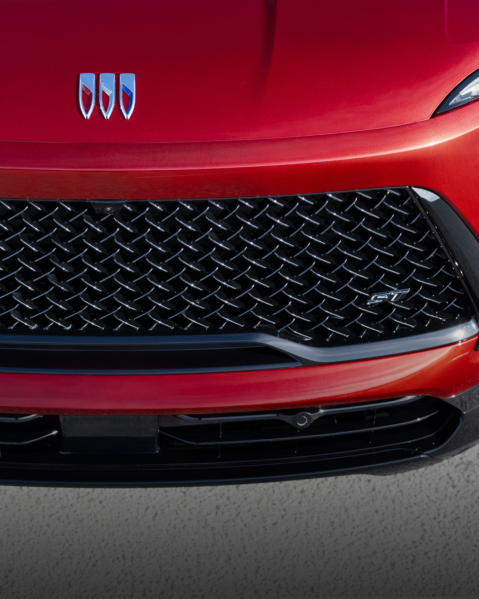 Close-up view of the Hood and Grille of the 2026 Enclave ST.
