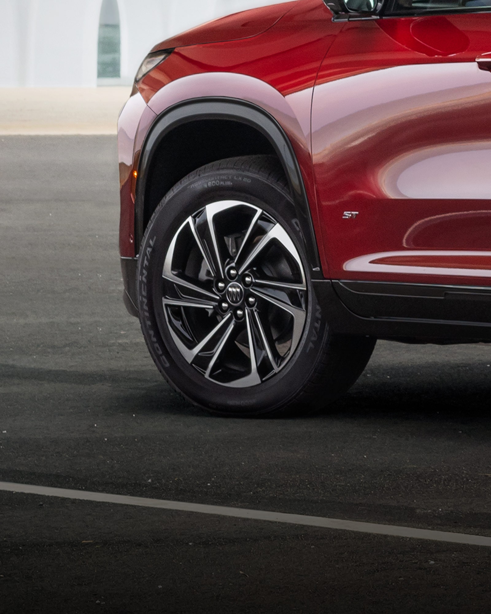 Close-up view of the High-Gloss Black wheels of the 2026 Buick Enclave ST.