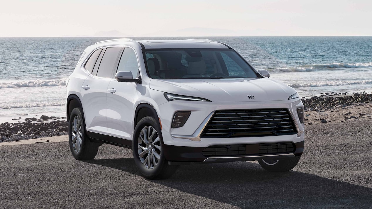 Front-side view of a 2026 Buick Enclave parked by the beach.