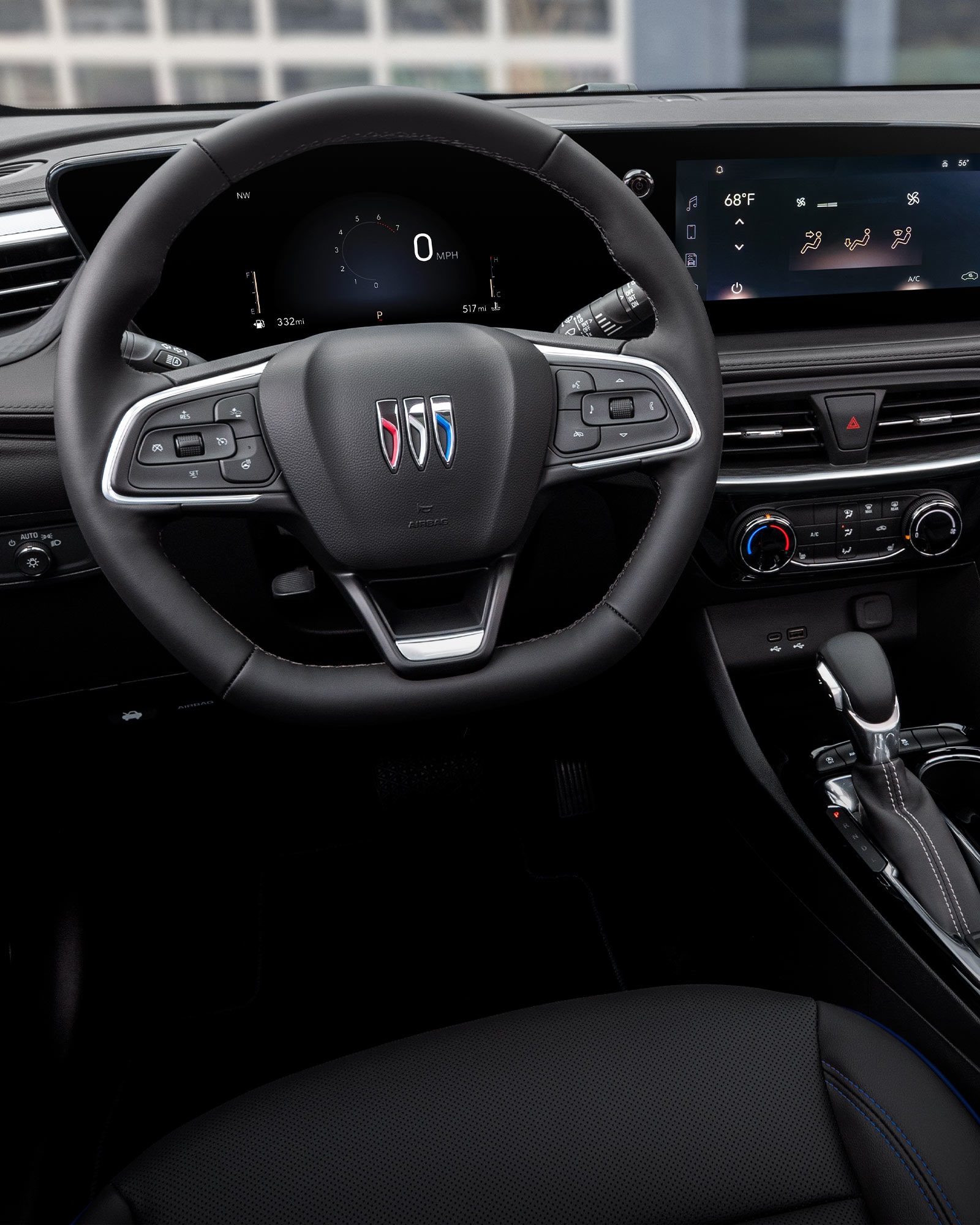 Driver's view of the front interiors of the 2026 Buick Encore GX ST.