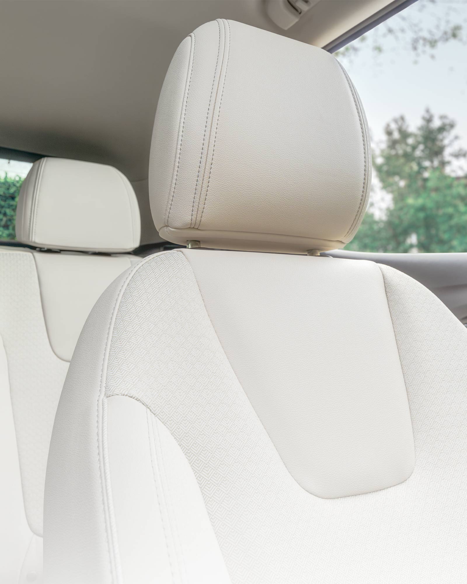 Vue rapprochée des sièges en cuir du Buick Encore GX Privilégié 2026.