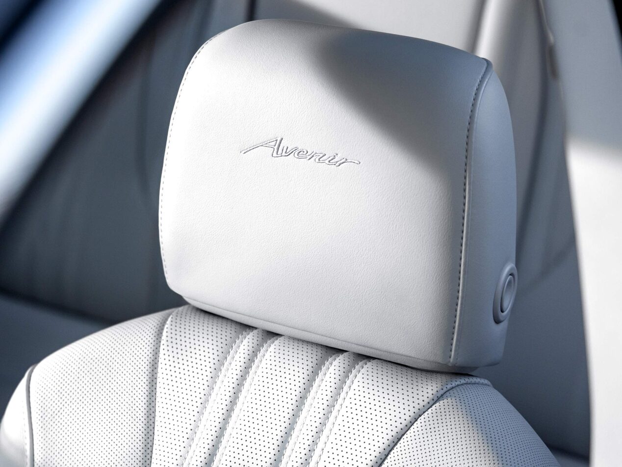 Close-up of the Quilted Leather-Appointed Front Seats with the Avenir Logo Embroidered on the Headrests in the 2026 Buick Envision Avenir Luxury SUV