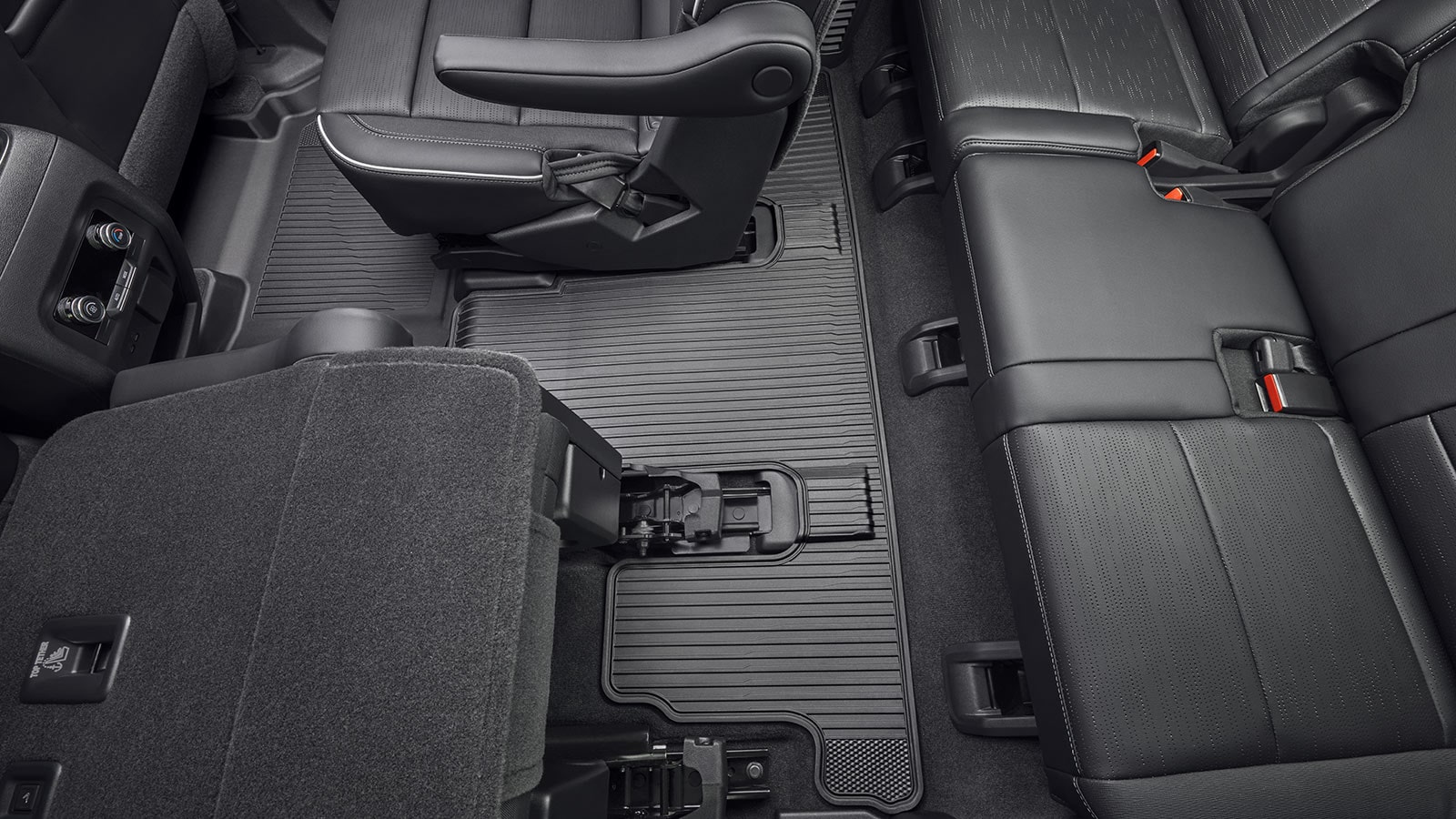 An Interior View of a 2027 Buick Enclave Avenir SUV Showing Black All Weather Floor Liners.