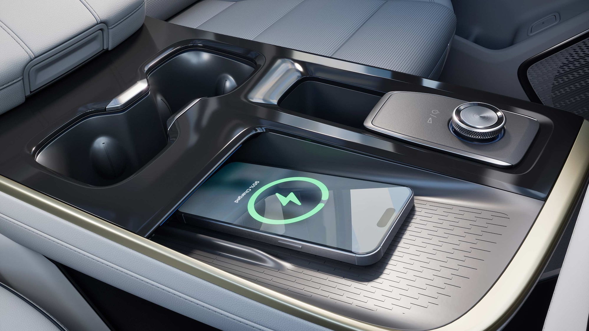Un gros plan de la console centrale Buick avec un téléphone qui se recharge sans fil.