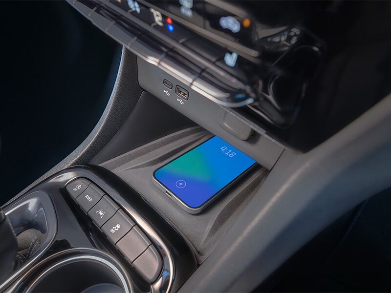 Close up view of the wireless charging area of the 2025 Buick Encore GX Avenir.