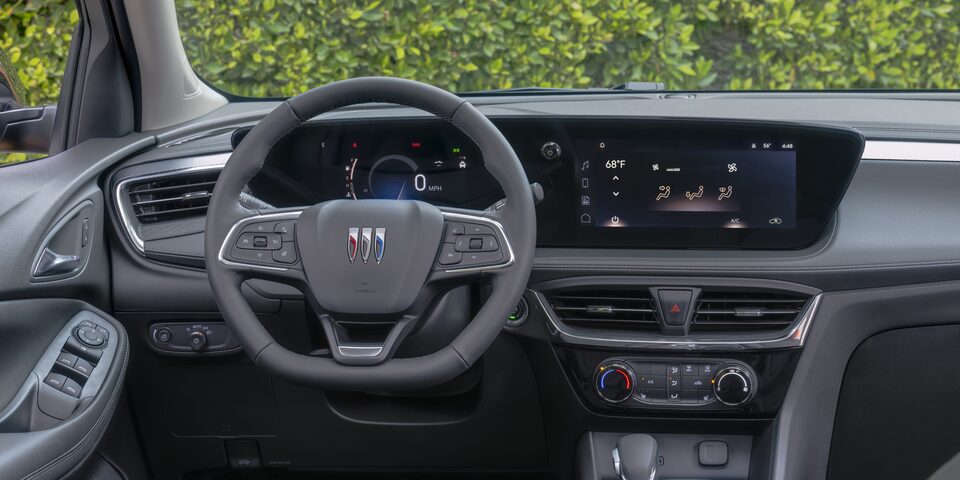 Rear passenger's view of the interiors of the 2024 Encore GX ST.