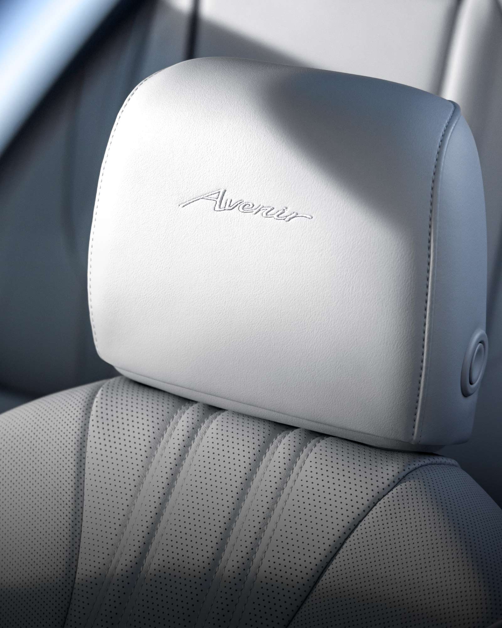 Close-up of the Interior Quilted Perforated Front Leather-appointed Seats in the Buick Envision Avenir Luxury SUV.