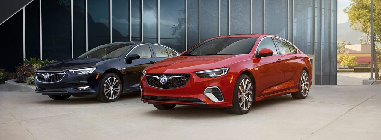 Discontinued 2020 Buick Regal Sportback and 2020 Buick Regal GS parked outside.