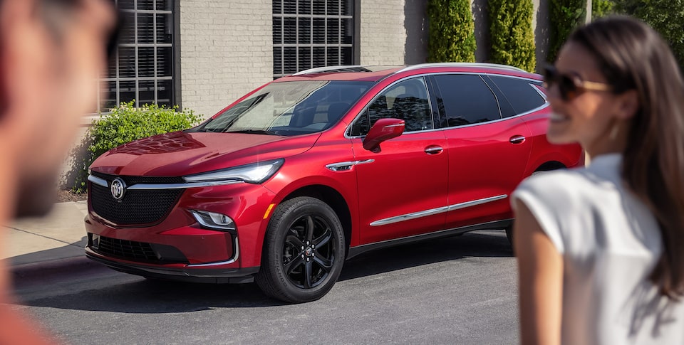 Buick Enclave Sport Touring driving in the city.