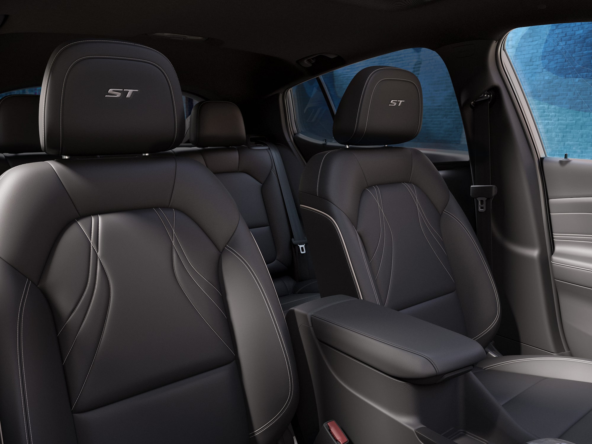 Three-quarters View of the 2026 Buick Envista Driving Out of the City Under a Street Light