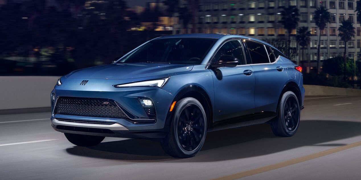 The Front View of a 2026 Buick Envista ST SUV Driving Down a City Street