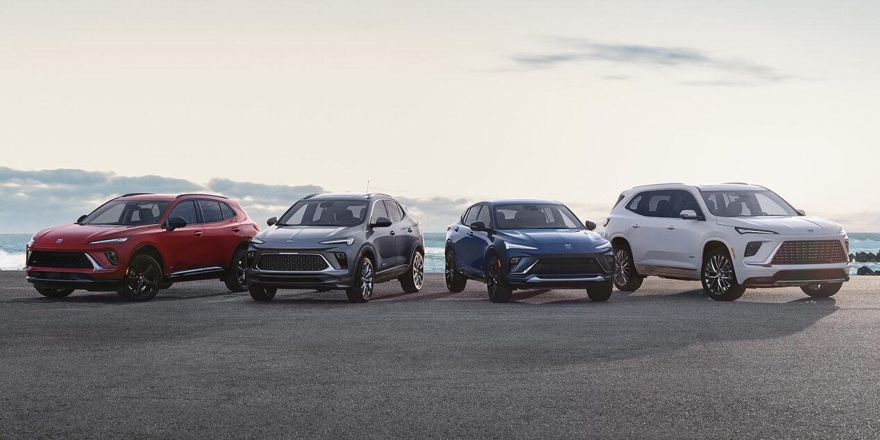 The Buick GMC Lineup Parked Near a Body of Water on a Sunny Day