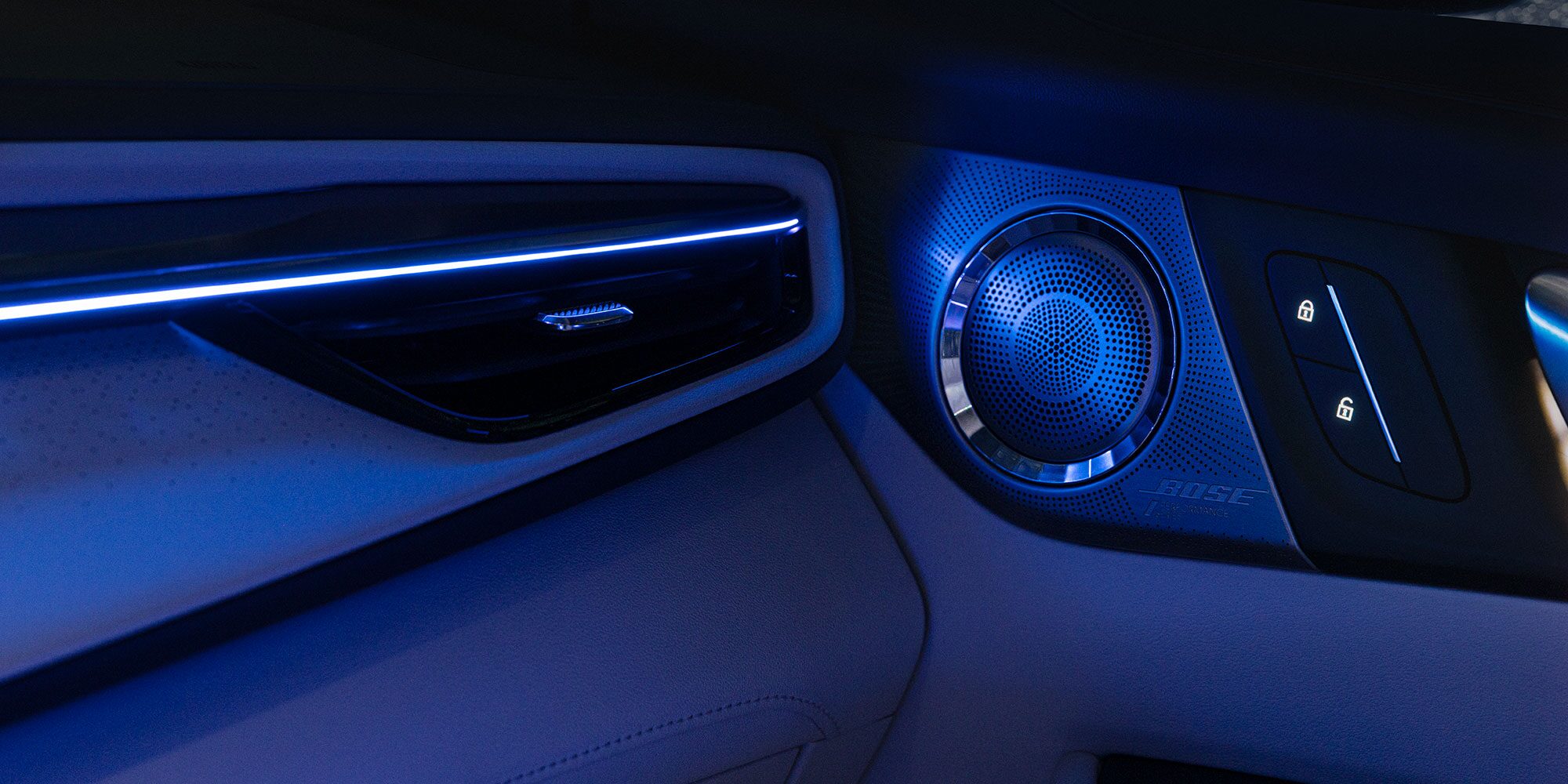 Interior View of the Buick Bose Sounds Systems Speaker with a Blue Hue over the image