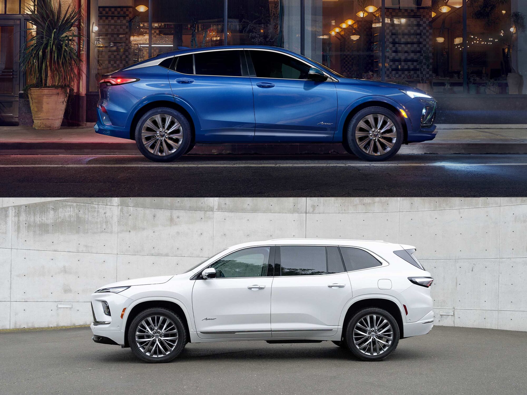 A Blue Buick SUV Parked by a City Street at Night Alongside a White Buick SUV Next to a Concrete Wall