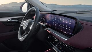 Interior View of the Steering Wheel and Infotainment Screen in the Buick Enclave