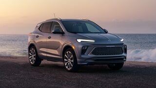 Front Three-Quarters View of the Buick Encore GX Parked on the Beach at Sunse
