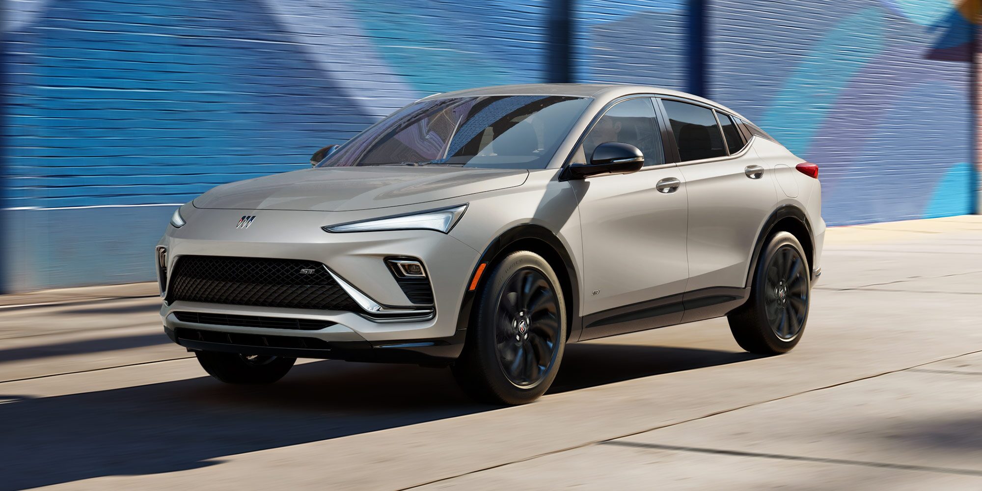 Front View of the 2026 Envista ST SUV Driving Down a City Steet