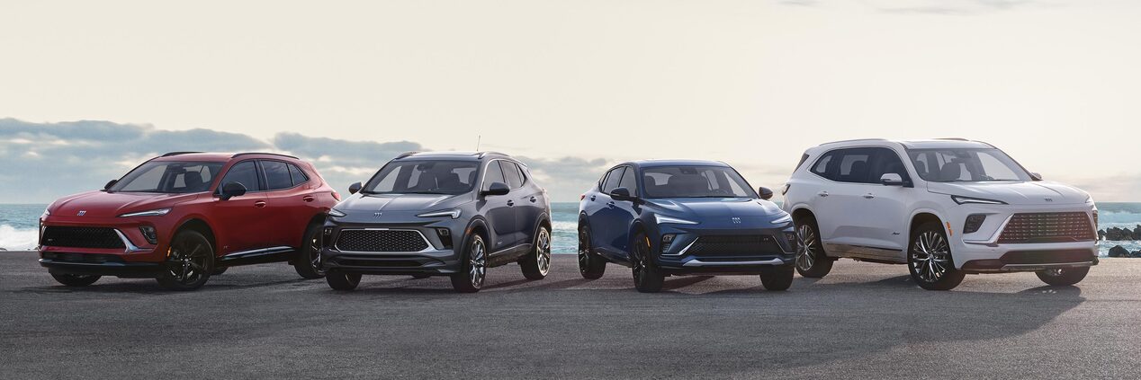 The Buick GMC Lineup Parked Near a Body of Water on a Sunny Day