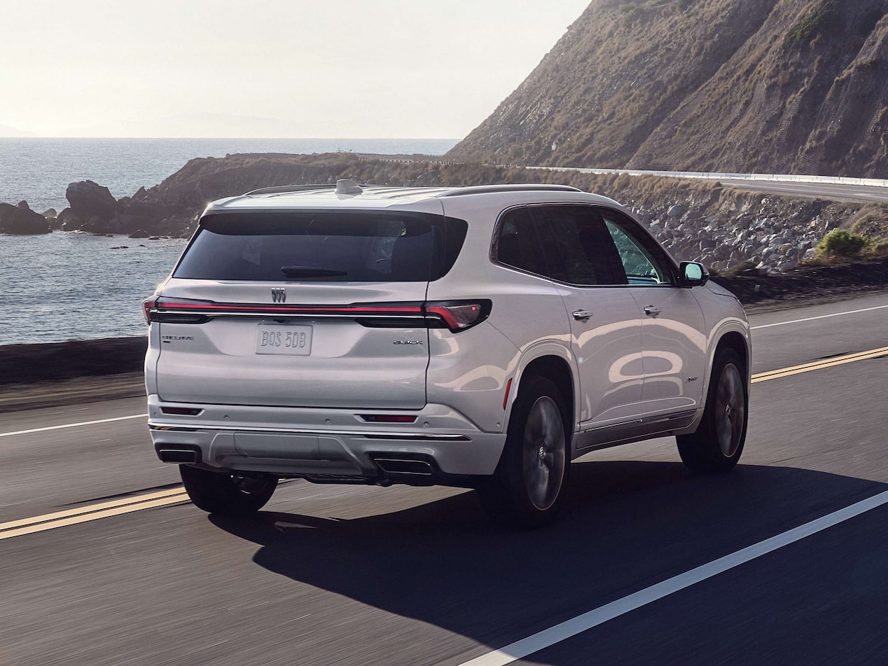 Rear View of a Buick Vehicle Driving up the Coastline on a Sunny day