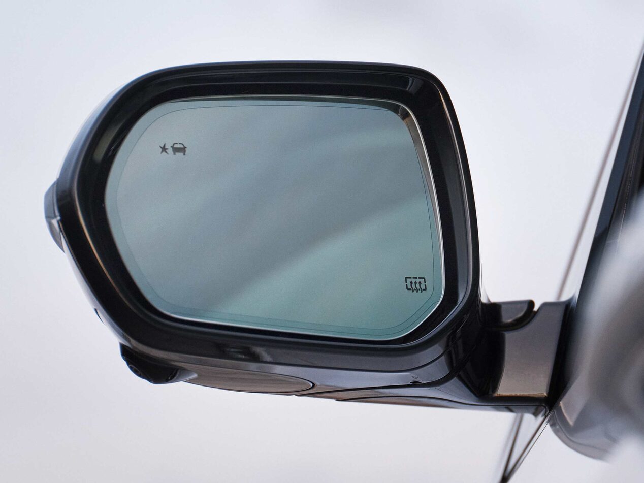 Close-up of the Drives Side Side-View Mirror on a Buick Vehicle