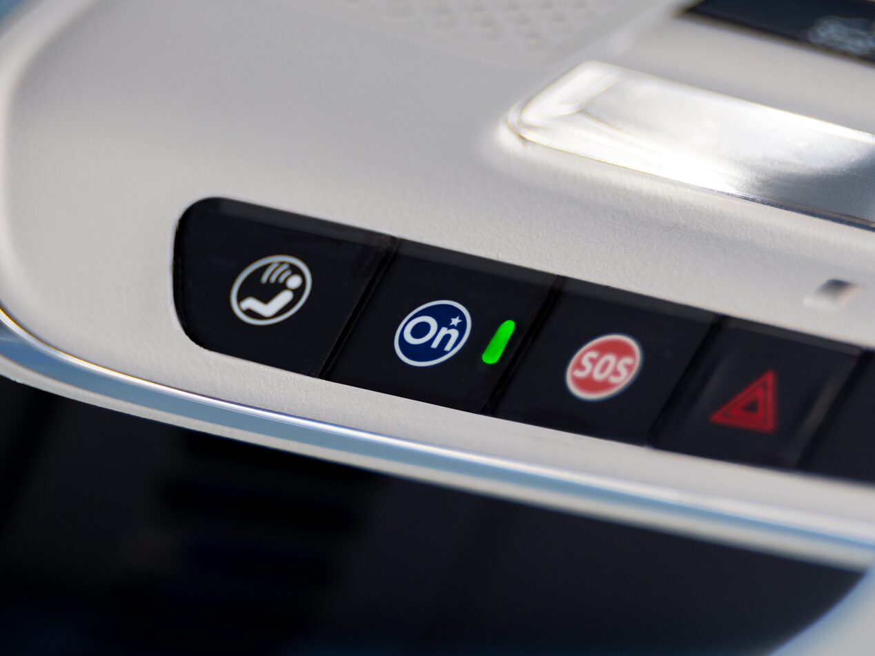 Close-up of the Blue OnStar Button in a Buick Vehicle