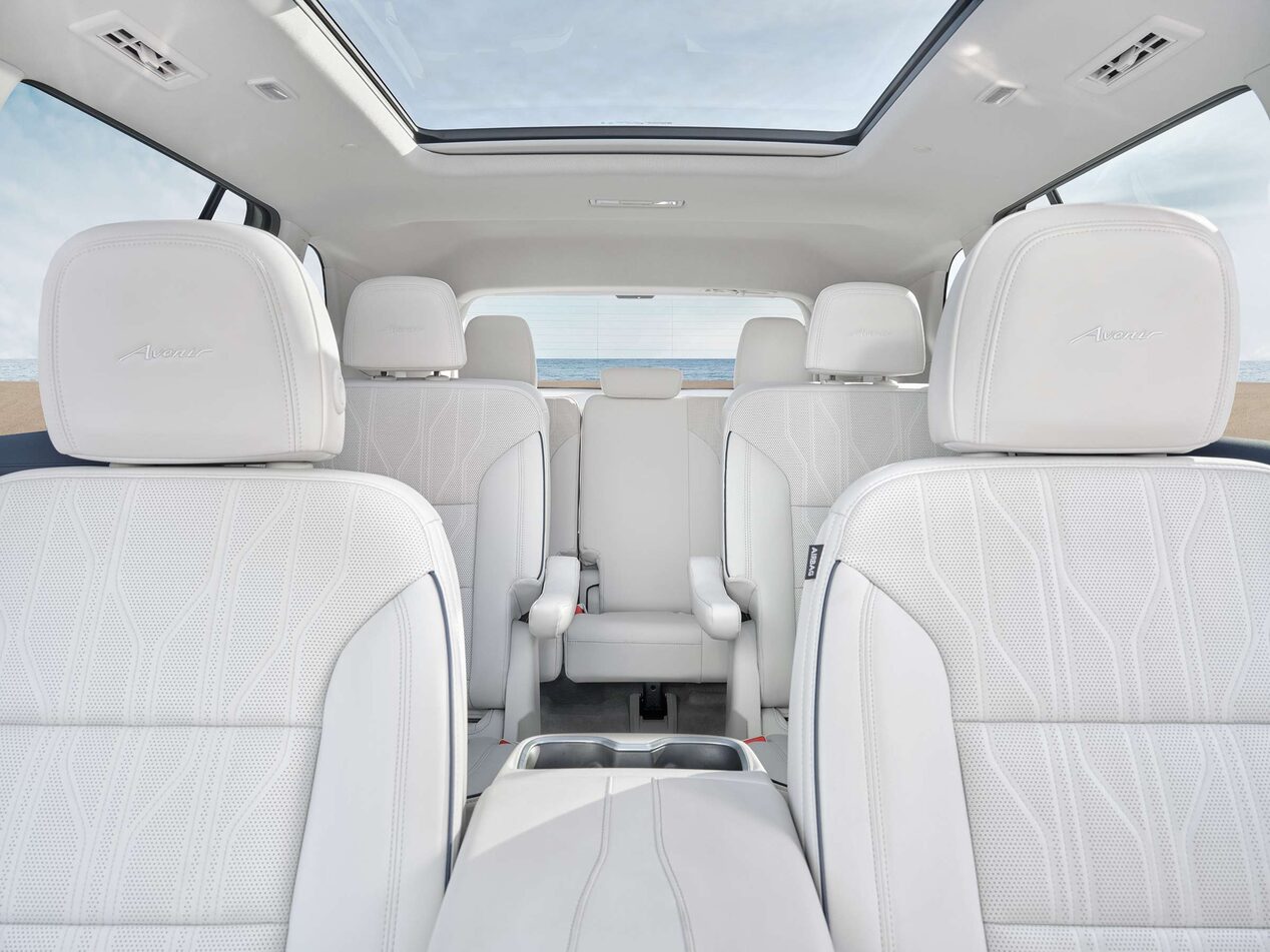 View of the White Interior Three-Row Seating in a Buick Vehicle
