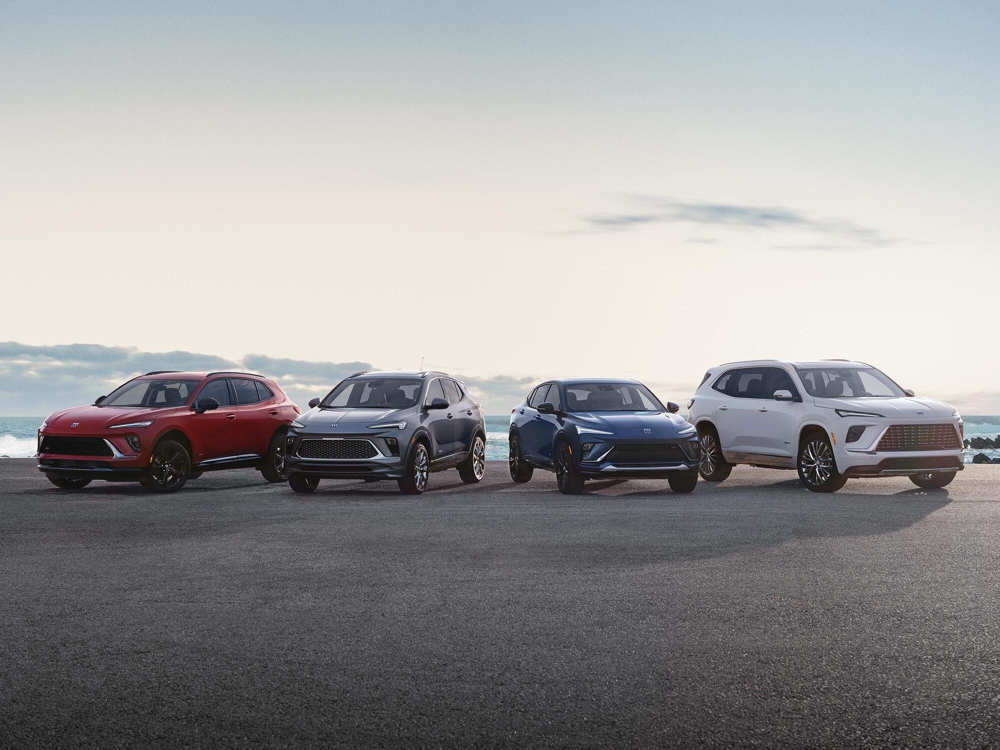 View from the open tailgate showing the Interior of a Buick SUV with the Rear Seats Folded Down