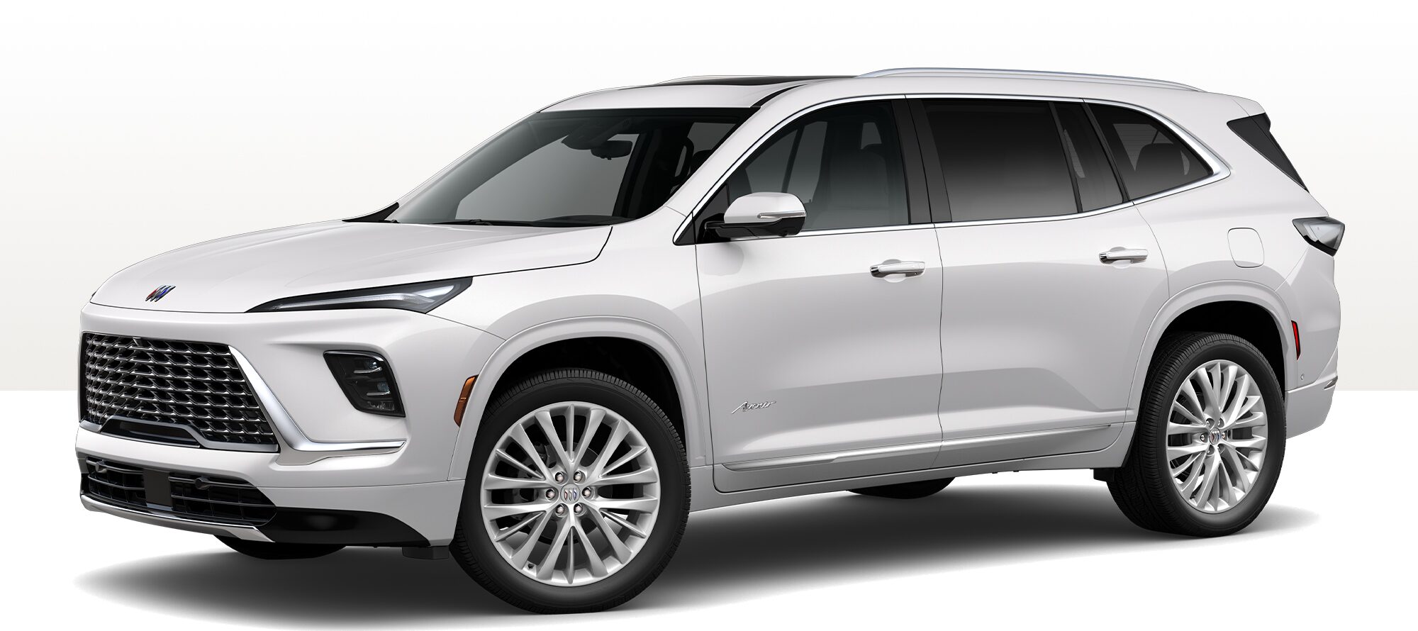 A 2025 Buick Enclave Avenir SUV in White on a Clean Studio Background